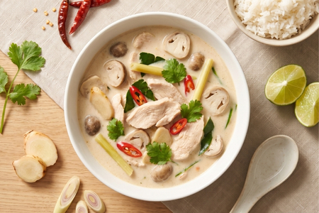 Thai Tom Kha Gai coconut chicken soup with mushrooms and herbs